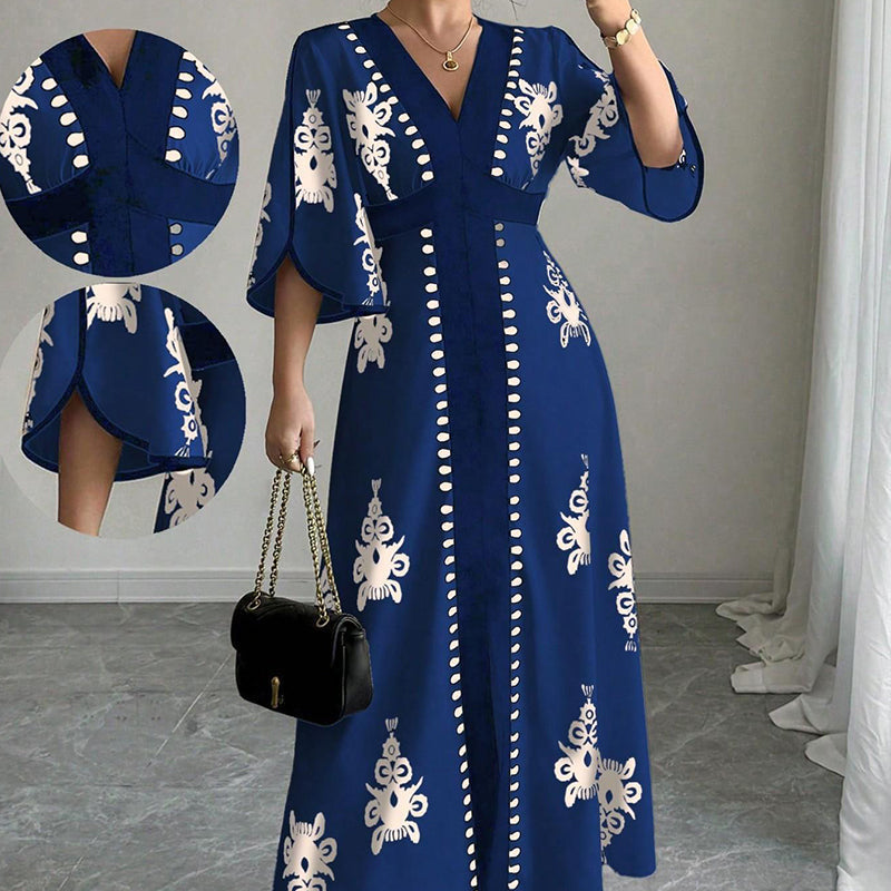 Elegantna ženska obleka v maxi kroju z V-izrezom in potiskom