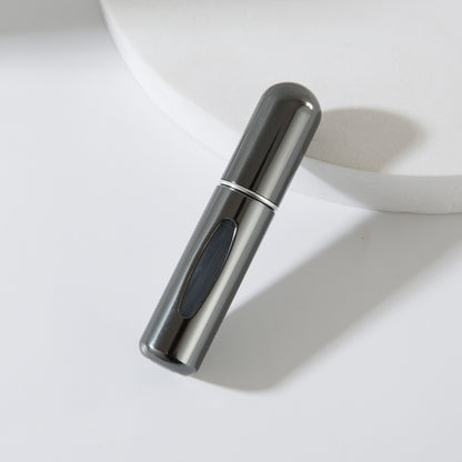 Bottom-fill perfume refill bottle with self-pump sprayer
