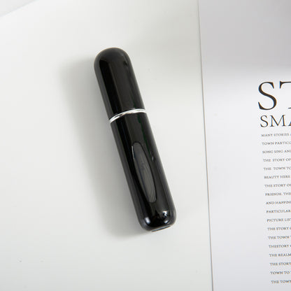 Bottom-fill perfume refill bottle with self-pump sprayer