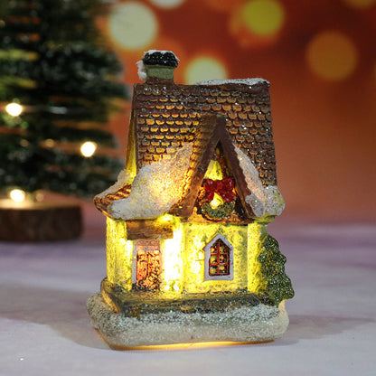Miniaturowy domek bożonarodzeniowy z oświetleniem LED
